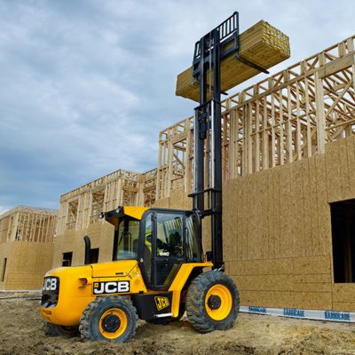 Forklift unloading machinery and industrial equipment in Stratford